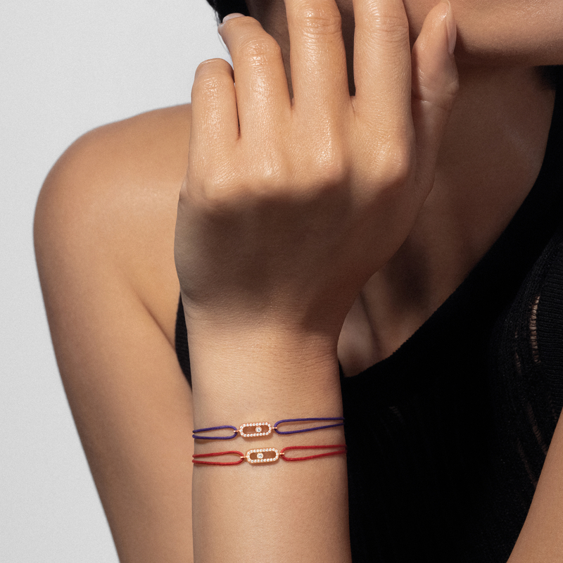 Move Uno red cord bracelet