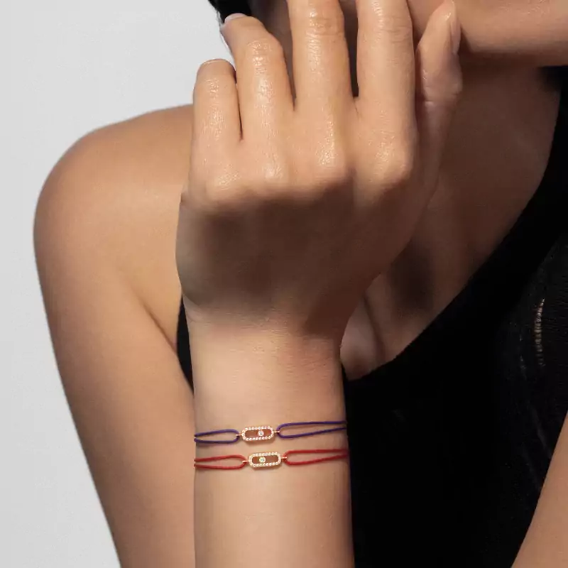 Move Uno red cord bracelet